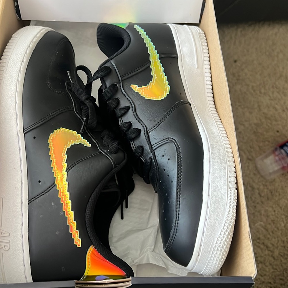 Black and white and green Air Force ones